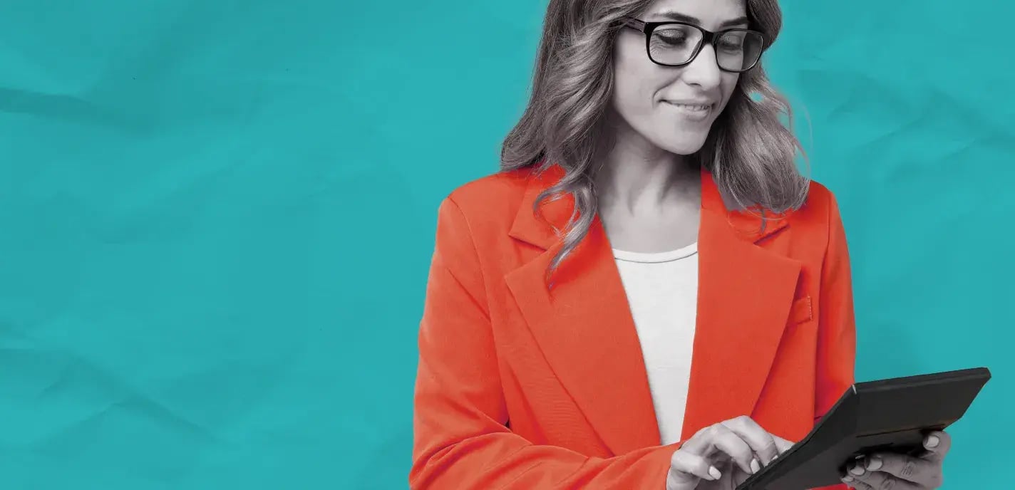 Female attorney using calculator against teal background.