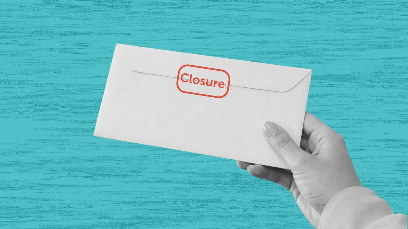 Hand holding an envelope with 